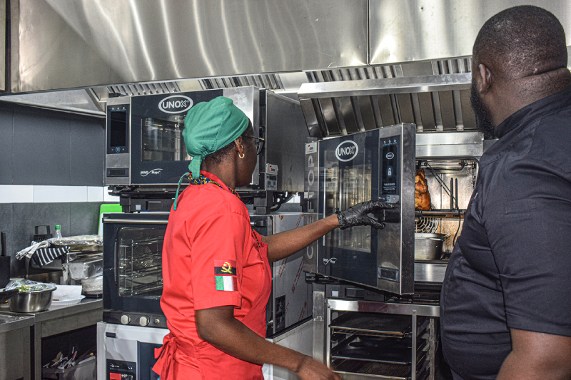 image of chef preparing dishes (for a chinese restaurant)